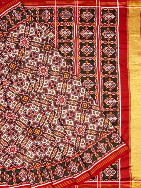 White Manekchowk Patan Patola Saree by Nirmal Salvi